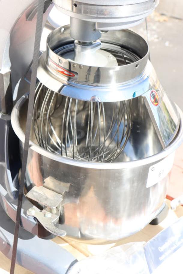 Vollrath 40757 20 Qt. planetary stand mixer with safety guard, visible damage, includes standard accessories, 120V, 1/2 hp.