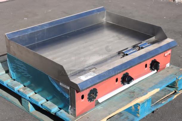 Avantco Chef Series CAG-36-TG 36" countertop gas griddle, stainless steel, thermostatic controls, 105,000 BTU, missing one knob.