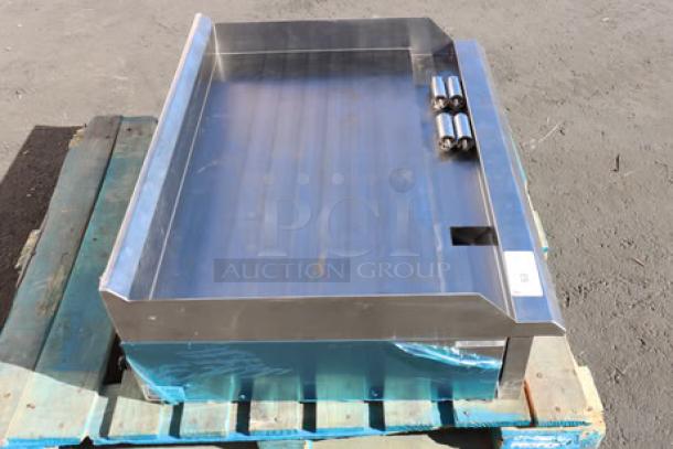 Avantco CAG-36-TG 36" countertop gas griddle, brand new, out of box, missing knob, 105,000 BTU, thermostatic controls.