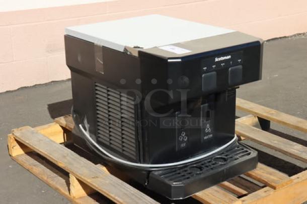 Scotsman HID207AX-1 Meridian ice machine, brand new, out of box on pallet. Black finish, touch-free ice and water dispensers.