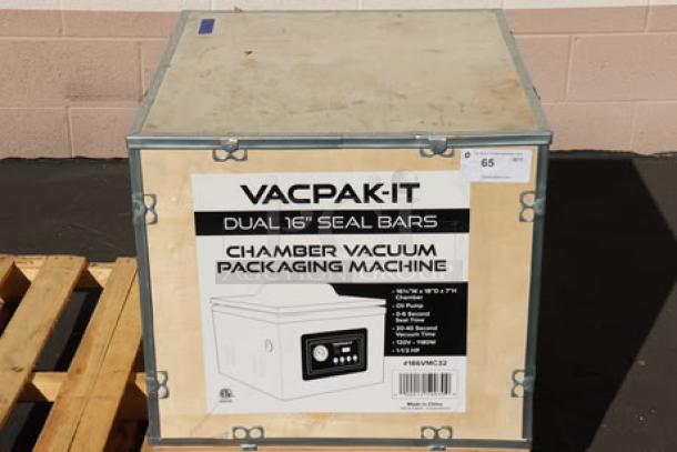 VacPak-It VMC32 chamber vacuum packaging machine in crate, features two 16" seal bars, oil pump, 120V, 9A, 1,180W. Brand new.