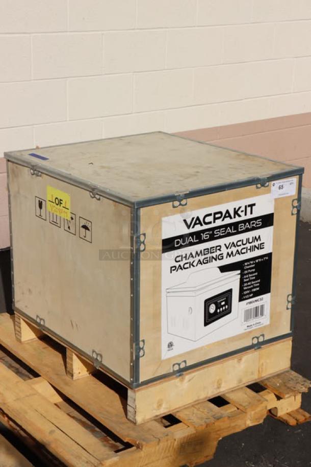 Brand new VacPak-It VMC32 chamber vacuum packaging machine in crate with dual 16" seal bars, oil pump, 120V, 9A, 1,180W.