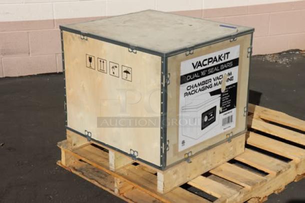 Brand new VacPak-It VMC32 chamber vacuum packaging machine, crated, with dual 16" seal bars, oil pump, 120V, 9A, 1,180W.