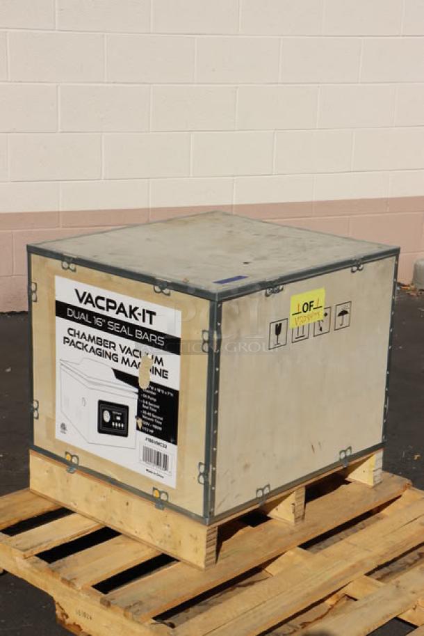 Brand new VacPak-It VMC32 chamber vacuum packaging machine, in crate, with two 16" seal bars, oil pump; 120V, 9A, 1,180W.