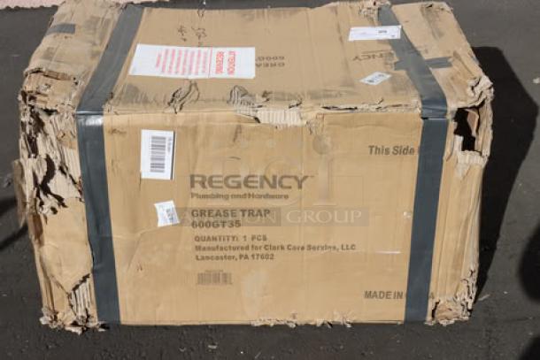 Regency 600GT35 grease trap, PDI certified, 70 lb. capacity, 35 GPM, 3" non-threaded connections, brand new in damaged box.