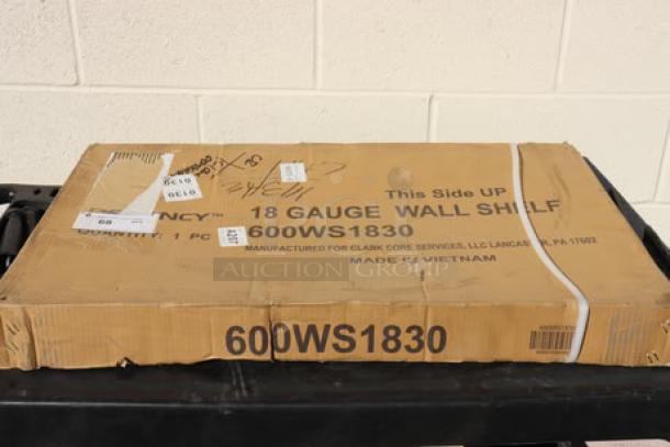 Brand new Regency 600WS1830 18"x30" 18 gauge stainless steel wall shelf in original packaging, marked "scratch-n-dent."