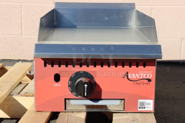 Brand new Avantco CAG-15-TG gas griddle, 15", with thermostatic controls, slight scratches, 35,000 BTU, serial number visible.