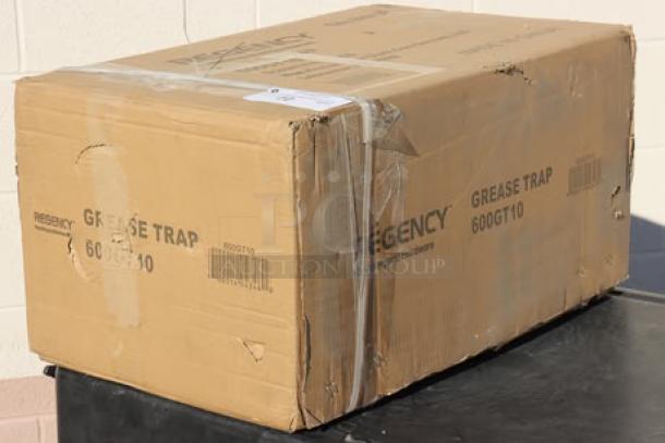 Regency 20 lb. 10 GPM Grease Trap, model 600GT10, in damaged original packaging. May have scratches and dents.
