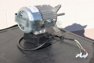 Blodgett 56966 blower motor, brand new, out of packaging, visible wiring, metal casing, ideal for industrial use.