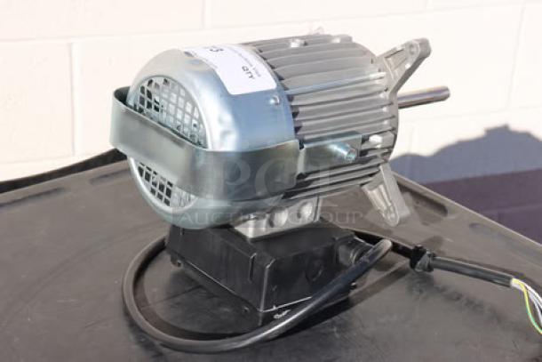 Blodgett 56966 blower motor, brand new, out of original packaging, features protective casing and wiring.