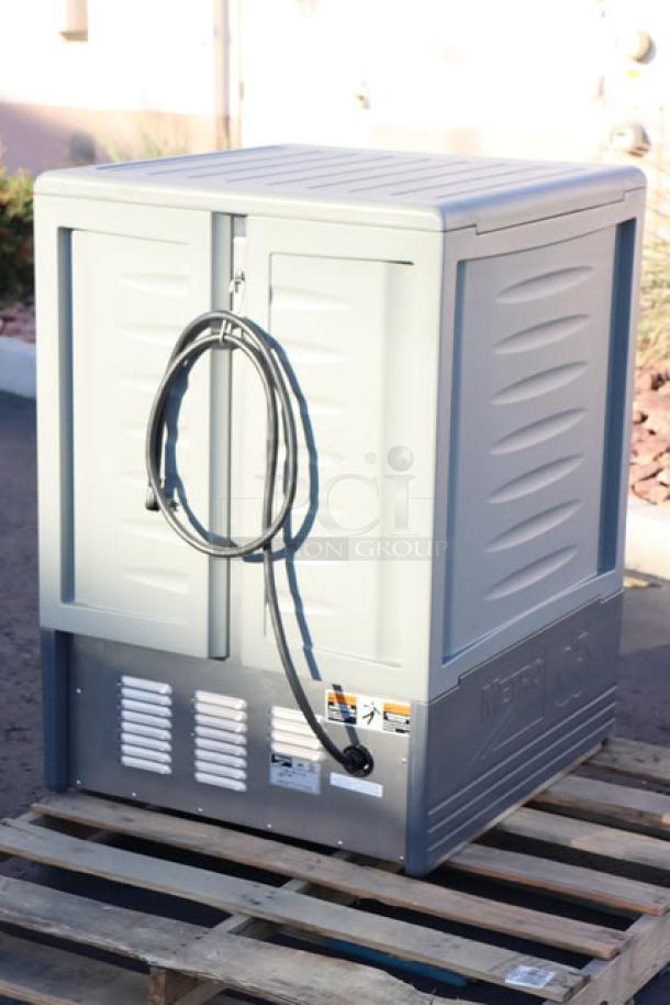 Metro C535-HFS-U-GY Heated Holding Cabinet, brand new, gray, 120V, 16.7A, 1-phase, 2000W, on a pallet, with labels visible.