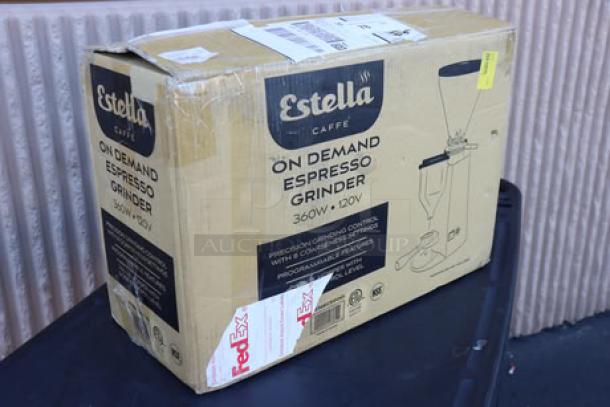 Brand new Estella Caffe ECEGOD On Demand Espresso Grinder in original damaged packaging; potential scratching and denting.