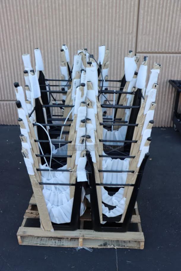 Brand new Lancaster Table & Seating Alloy Onyx Black backless barstools, model 164BNBKLSBLK, unboxed, minor scratches.