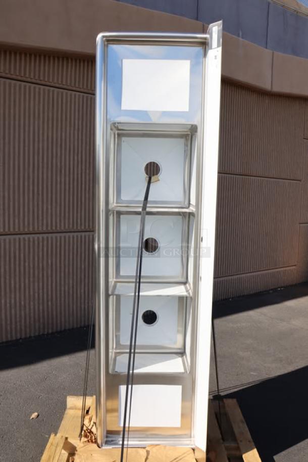 Brand new Steelton 522CS31818LR 90" stainless steel commercial sink with three 18"x18"x12" compartments, no legs, minor scratches.