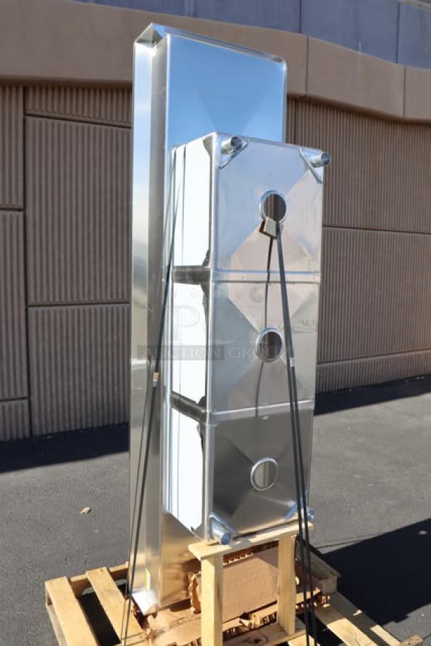 Brand new Steelton 522CS31818LR 90" 18-gauge stainless steel three compartment sink with two drainboards; minor scratches or dents.