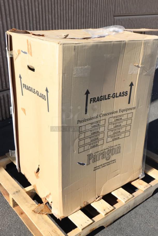 Paragon 1112810 Classic Pop 14 oz. Popcorn Machine, new in original packaging on pallet, labeled "Fragile Glass." Glass pane broken.