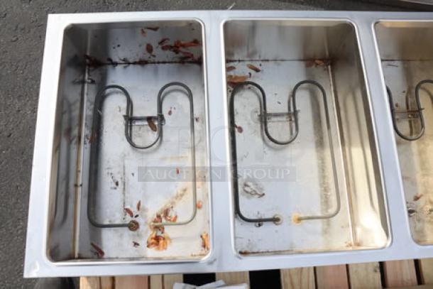 ServIt 423ESTSWOPB five pan steam table, new scratch-n-dent, dirty wells, partially enclosed base, possible missing parts.