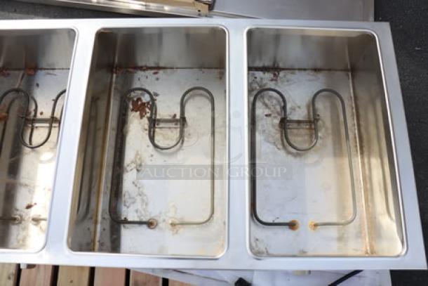 ServIt 423ESTSWOPB five pan electric steam table, dirty wells, partially enclosed base, brand new scratch-n-dent condition.