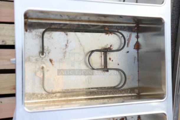 ServIt 423ESTSWOPB five pan open well electric steam table, dirty wells, possible missing parts, partially enclosed base.