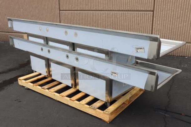 Regency 600S32424224 stainless steel 3-compartment sink with 2 drainboards, unboxed, minor dents, missing small parts.