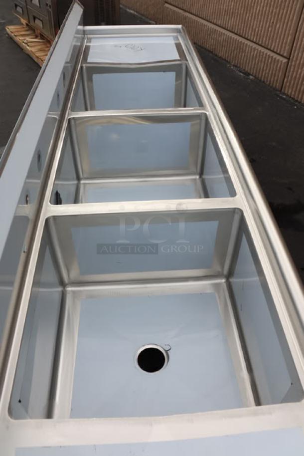 Regency 600S32424224 124" stainless steel sink with 3 compartments, 2 drainboards, new but unboxed. May have minor dents.