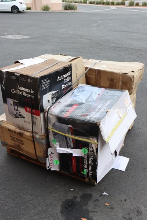 Mixed lot of kitchen equipment on a pallet, including Regency and Avantco items. Boxes are damaged and may contain scratched or incomplete items.