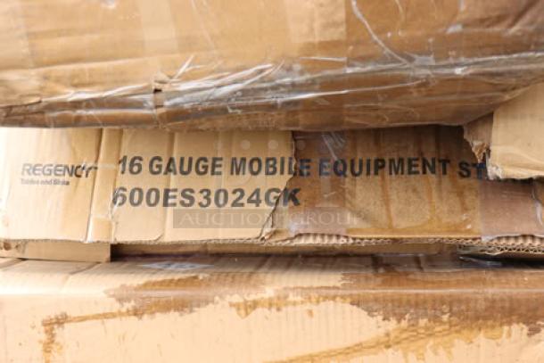 HUGE lot of mixed brand new kitchen equipment with possible scratches or dents. Visible Regency 16 gauge mobile equipment stand box.