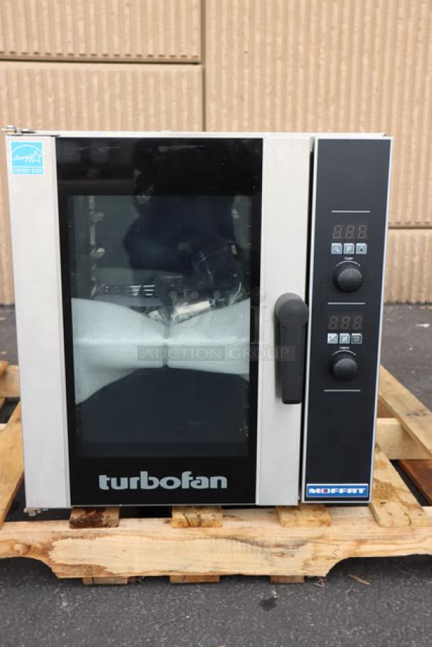 Brand new Moffat E33D5-P Turbofan electric convection oven, digital controls, steam injection, 208V, minor dents.