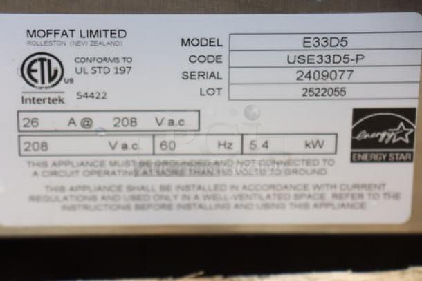 Moffat E33D5-P convection oven label displaying model, serial number 2409077, voltage, and energy specifications.