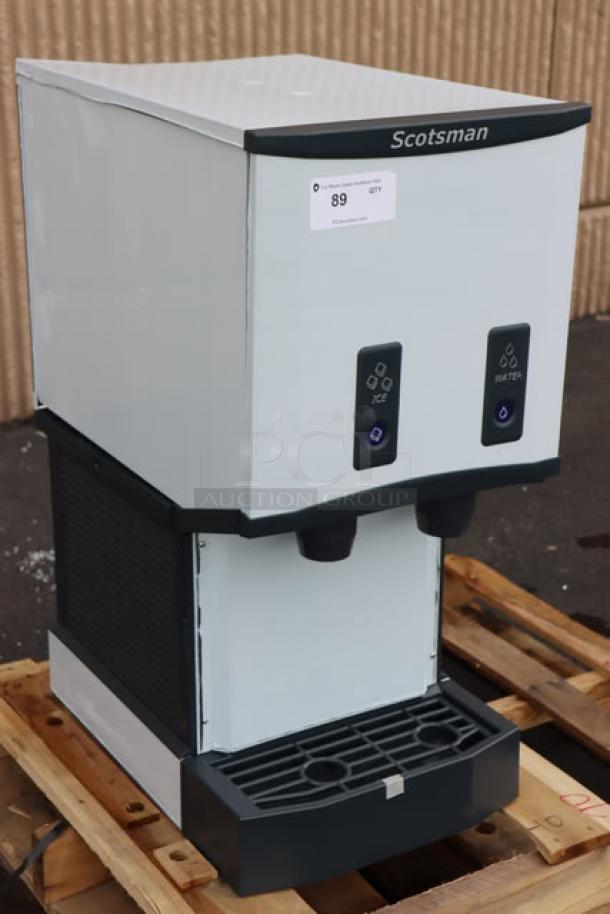 Scotsman HID312ABX-1A Meridian® countertop nugget ice machine, air-cooled, push button, 12 lb bin, dent on top.