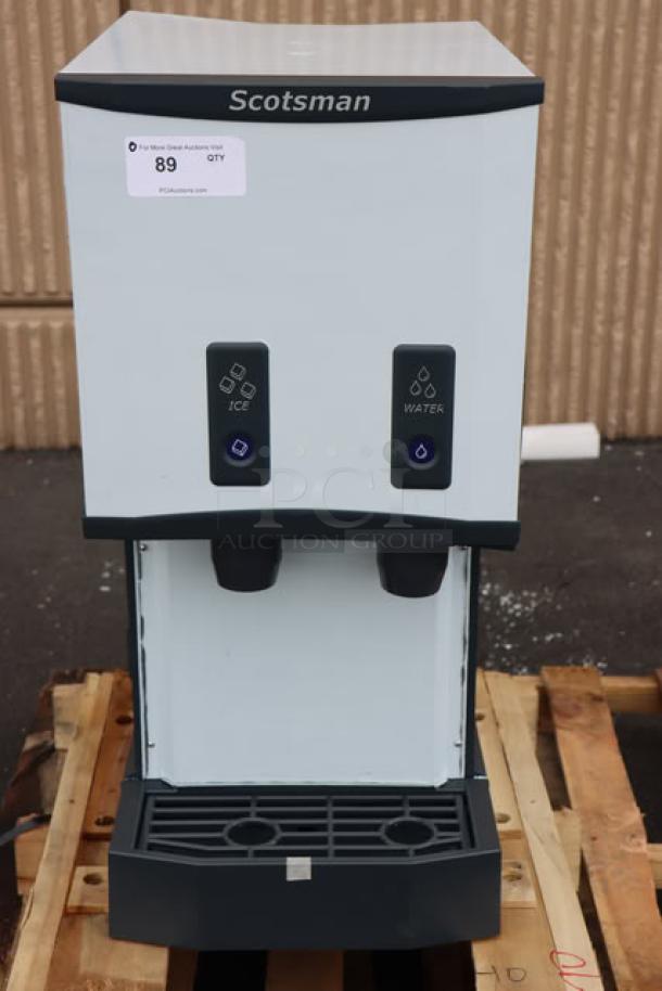BRAND NEW Scotsman HID312ABX-1A countertop nugget ice machine, 12 lb. bin, air-cooled, dented top, 115V, with push button.