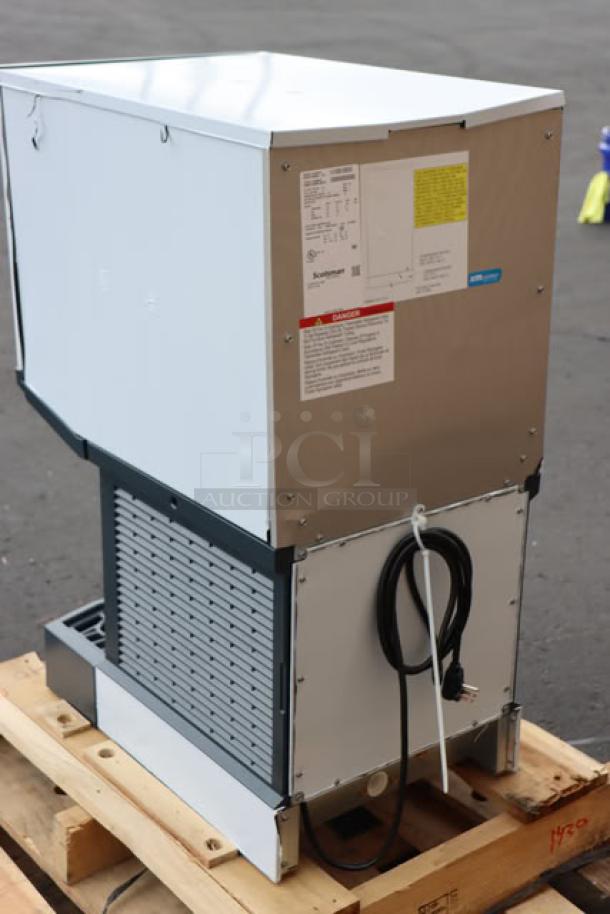Scotsman HID312ABX-1A Meridian nugget ice machine, brand new, dented top, 12 lb bin, 115V, 15A, 1 phase, on pallet.