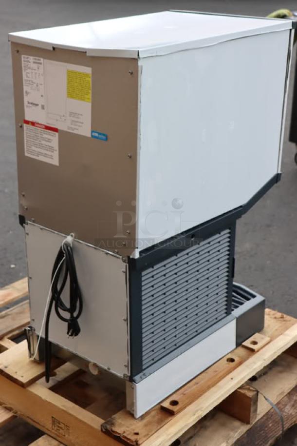 Brand new Scotsman HID312ABX-1A ice machine, unboxed, air-cooled, 12 lb bin, dented top, serial 25081320010814.