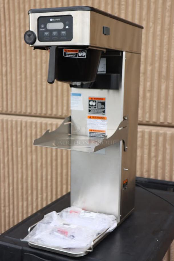Brand new Bunn 52200.0100 ITCB-DV coffee/tea brewer, adjustable shelf, dual voltage, 1700-3500W, includes tags and labels.