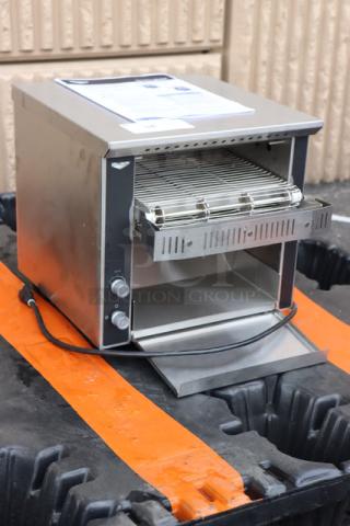 Brand new Vollrath CT2H-120250 JT1H conveyor toaster, 2 1/2" opening, 120V, 1600W; minor scratches; serial number visible.