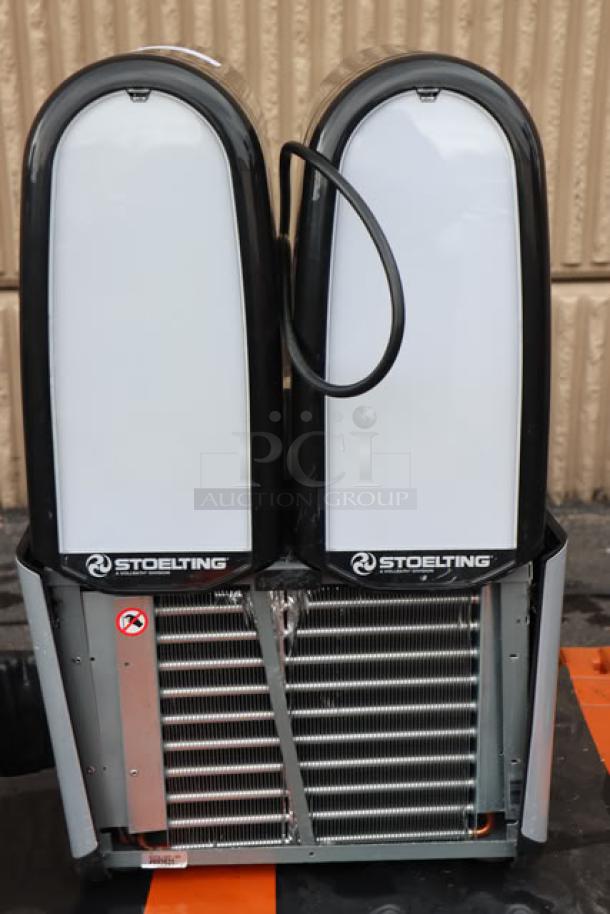 Brand new Stoelting SCBF128-37 double 2.6-gallon frozen beverage machine, 115V, out of packaging.