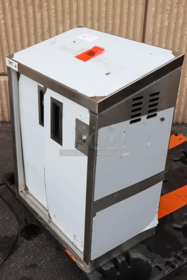 Regency 600WCS1524 stainless steel wall cabinet, 24", with sliding doors. Scratch-n-dent condition. New, visible wear.