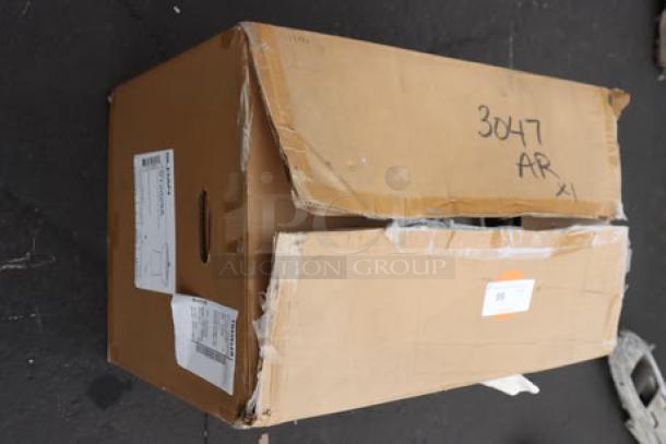 Sloan ST-2029-A Water Closet, ADA Compliant, visible in damaged box. Floor mount, top spud, vitreous china toilet bowl.