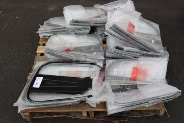 Lancaster Table & Seating black metal chair backrests, wrapped in protective material, new condition, 35 units.