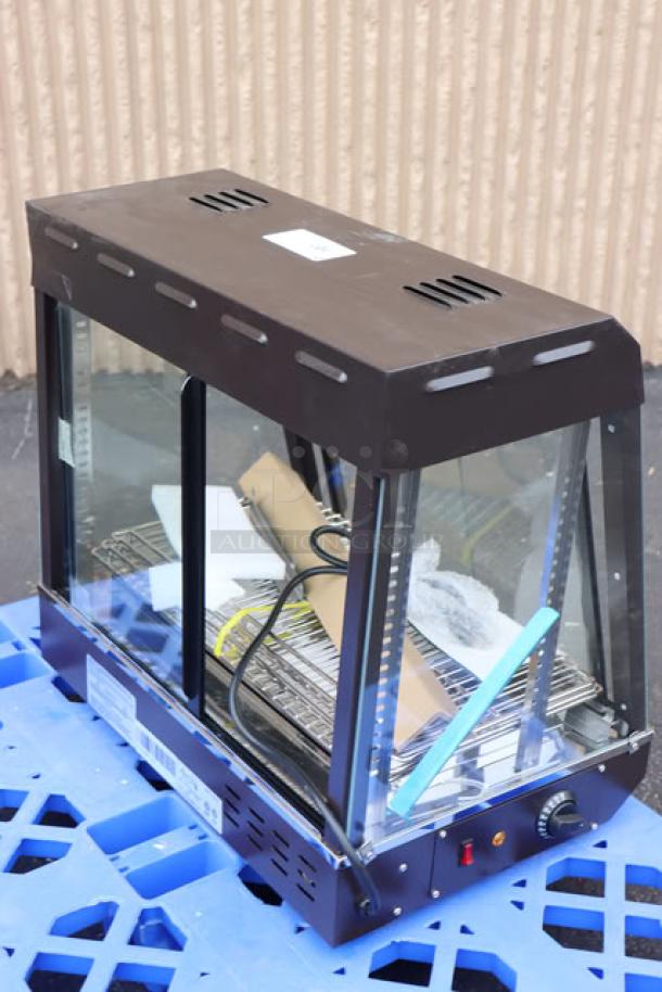 Brand new Avantco HDC-26 heated display case, 26", 3 shelves, sliding doors, 120V, 1580W. Scratch-n-dent condition.