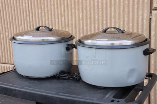 Avantco RCB124 rice cookers, brand new scratch-n-dent, 124 cup capacity, removable lids, electric, on black cart.