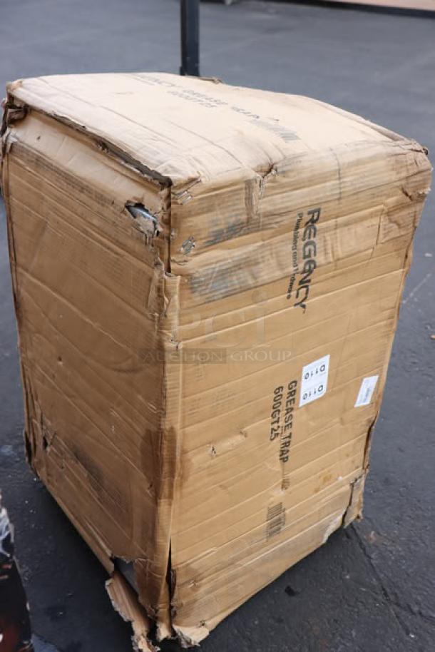 Regency 600GT25 50 lb. grease trap in damaged original packaging. Some scratching and denting possible. Non-threaded connections.