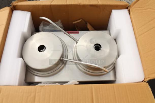 Carnival King RWS35DBL Double 3.5 Qt. Warmer with pumps in open damaged box, possible scratching and denting visible.