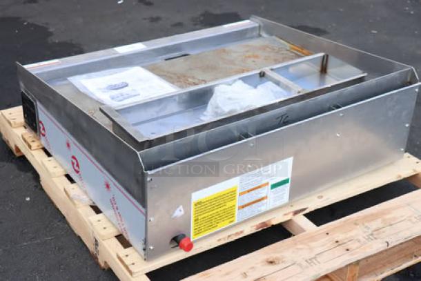 BRAND NEW Wolf by Vulcan AGM36-NAT 36" gas griddle, 81,000 BTU, manual controls, surface rust, on pallet.
