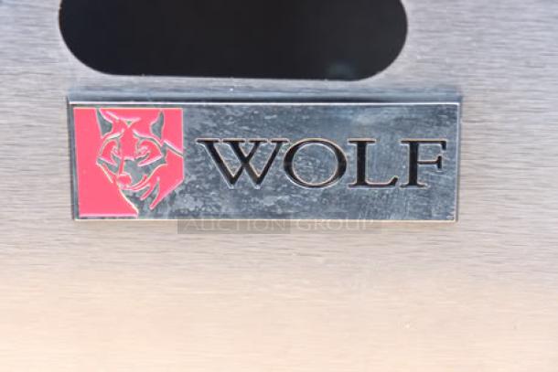 Wolf by Vulcan AGM36-NAT gas griddle, 36", 81,000 BTU, brand new, scratch-n-dent with surface rust, logo visible.