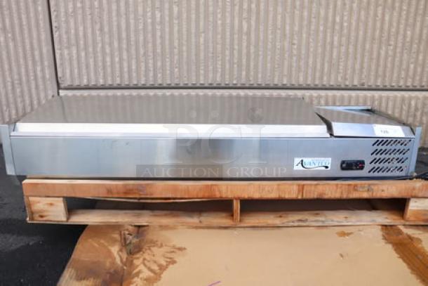 Brand new Avantco CPT-54 countertop refrigerated prep rail, 54", stainless steel, 115V, scratch-n-dent, on a pallet.