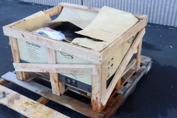 Brand new Avantco Chef Series CAG-24-MG 24" gas griddle, 60,000 BTU, in damaged packaging, may have scratches/dents.