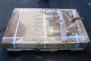 Regency 600TS3048S commercial work table in damaged packaging, showing possible scratches and dents. 30"x48" stainless steel.