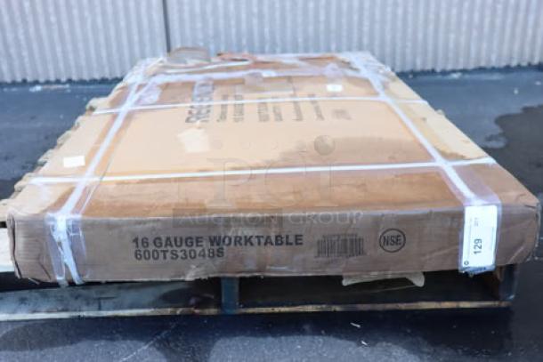 Regency 600TS3048S 30" x 48" 16-Gauge 304 Stainless Steel Work Table, new, packaging damaged, visible model markings.