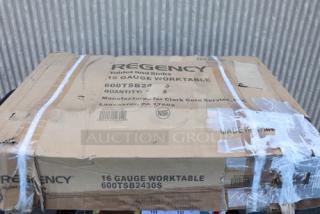 Regency 600TSB2430S 24" x 30" stainless steel work table in damaged packaging; features 4" backsplash, undershelf.